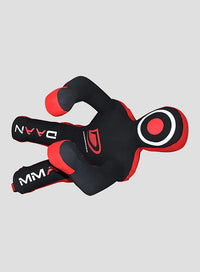 Black and red mma dummy on a light gray background