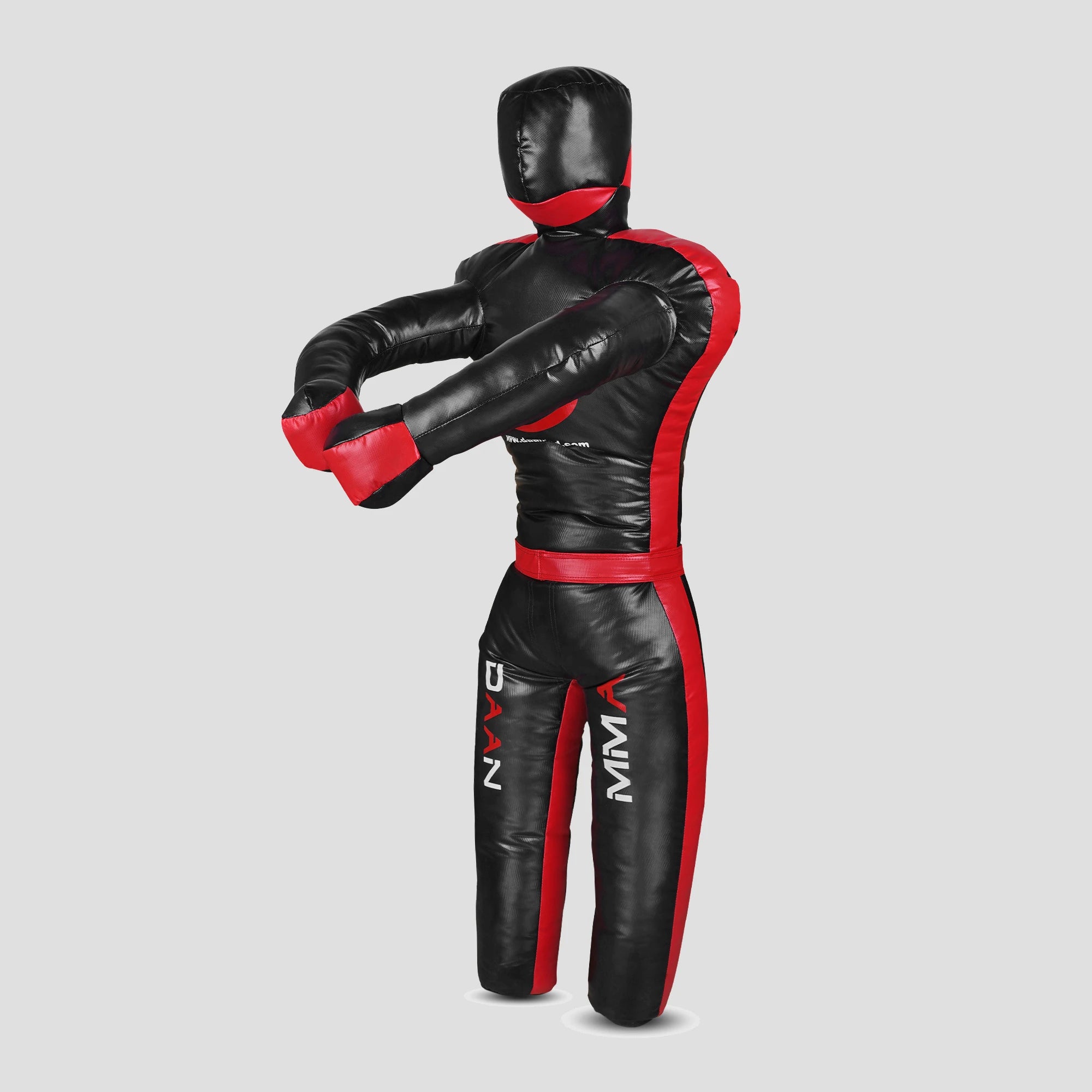 A black and red full-body MMA grappling dummy with a head and gloved hands, shown from the back against a light gray background.