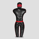 A black leather martial arts dummy with red trim and a red head band, shown from the back on a light gray background.