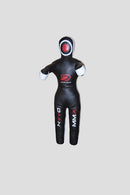 Black MMA training dummy with red eye on a dark background