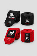 DAAN Core 4.5m boxing hand wraps in black and red, rolled and unrolled, showing DAAN Fight Gear labels