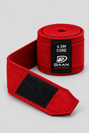 Red DAAN Core 4.5m hand wrap partly unrolled, showing the black hook-and-loop closure