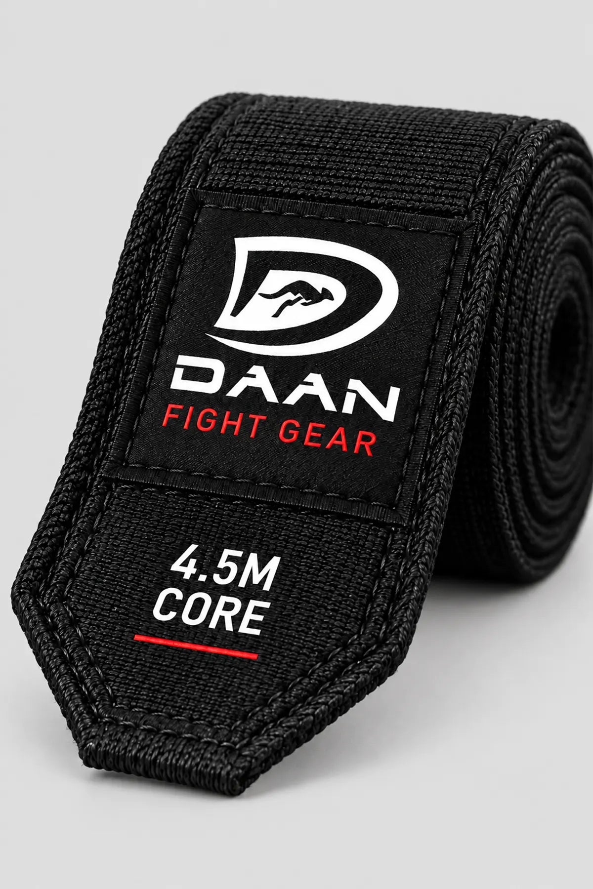 Black DAAN Core 4.5m boxing hand wrap, detail of the DAAN Fight Gear woven label and stitched edges