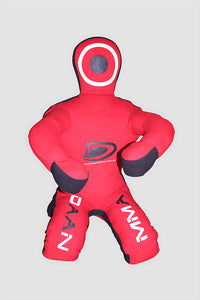 Red martial arts dummy with black accents on a gray background