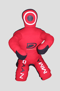 Red and black MMA training dummy with visible branding on a gray background