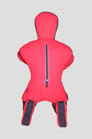 Red baby bouncer with black accents on a gray background