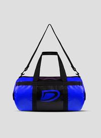 Blue duffel bag with black accents on a gray background