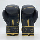 DAAN Apex boxing gloves back-to-back, matt black and gold cuff detail