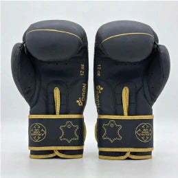 DAAN Apex boxing gloves back-to-back, matt black and gold cuff detail