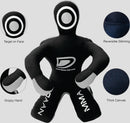 Black and gray training dummy with features highlighted on a white background