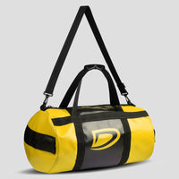 Yellow and black duffel bag with a brand logo on a light gray background