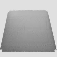 Gray tarp with a textured surface on a light gray background