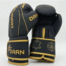 DAAN Apex boxing gloves upright pair, gold cuff branding