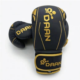 DAAN Apex boxing glove standing, bold gold DAAN logo
