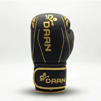 DAAN Apex boxing glove angled, gold detailing