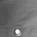 Close-up of a gray fabric surface with a metal grommet.