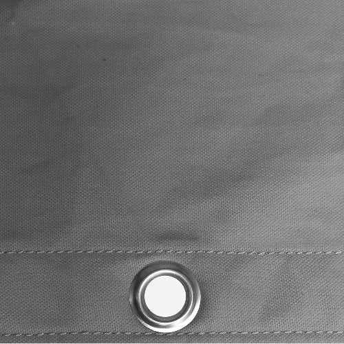 Close-up of a gray fabric surface with a metal grommet.