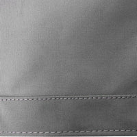 Close-up of gray fabric with stitching detail