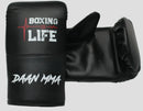 Black boxing glove with 'Boxing is Life' and 'Daan MMA' text on a white background