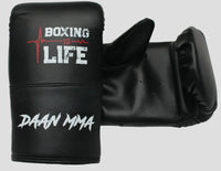 Black boxing glove with 'Boxing is Life' and 'Daan MMA' text on a white background