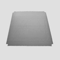 Gray tarp on a light gray background