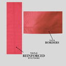 Red fabric with thick borders and triple reinforced stitching on a gray background